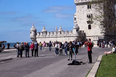 Tourists in front of historic building