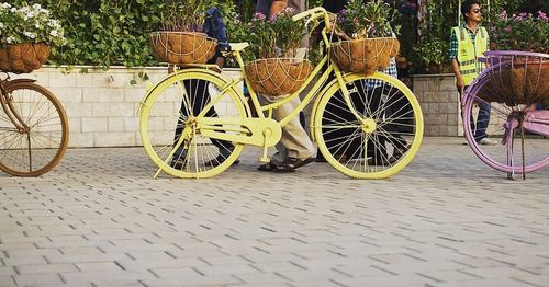 Close-up of bicycle against wall