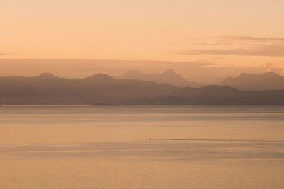 Scenic view of mountains at sunset