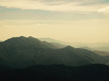 Scenic view of mountains against sky during sunset