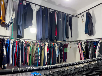 Close-up of clothes hanging in store