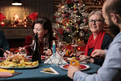 Portrait of woman having food at restaurant