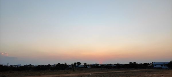 Scenic view of silhouette landscape against sky during sunset