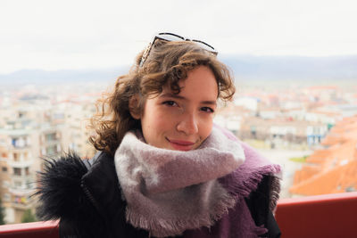 Portrait of young woman looking away