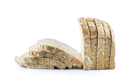 Close-up of bread against white background