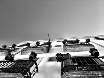 Low angle view of buildings against clear sky