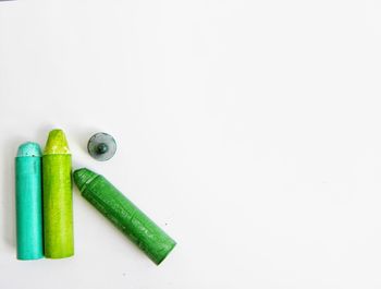 Close up of colored pencils against white background