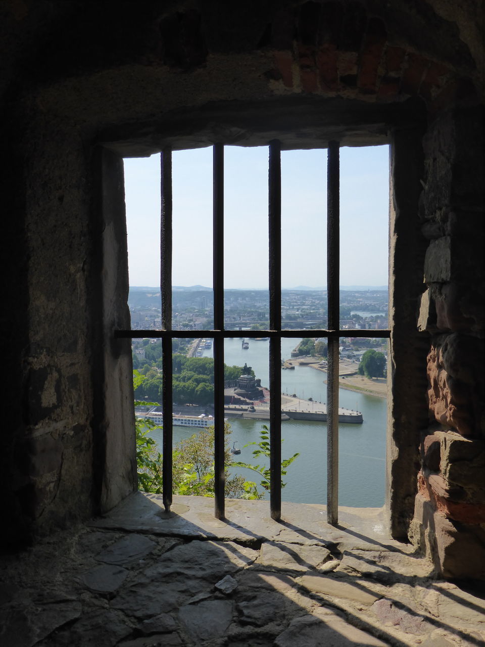 SEA SEEN THROUGH ARCH WINDOW