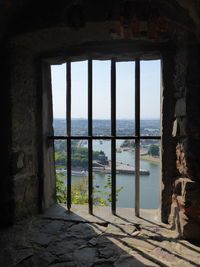 Sea seen through window of building