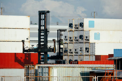 View of working in the port there is a container forklift.