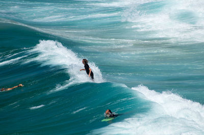 High angle view of people on sea