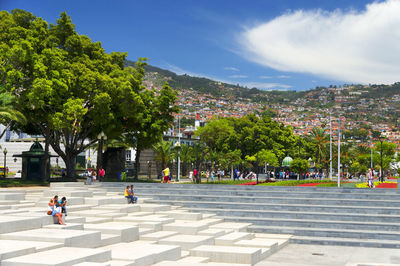 Group of people against townscape