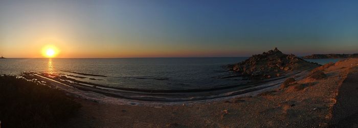 Scenic view of sea at sunset