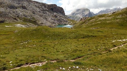 Scenic view of landscape and mountains against sky