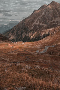 Scenic view of landscape and mountains against sky