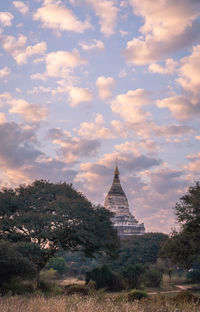 Historic building against cloudy sky