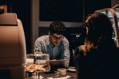 People working at table