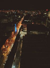 Illuminated cityscape at night