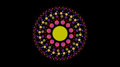 Close-up of illuminated lamp against black background