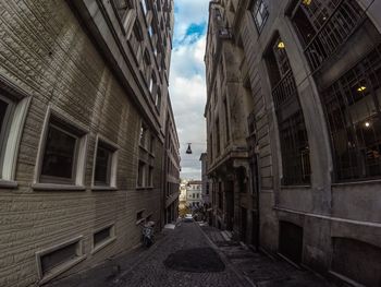 Narrow alley along buildings