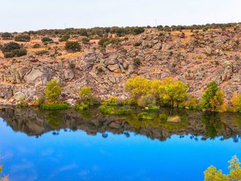 Scenic view of lake against clear sky