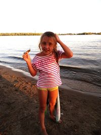 Portrait of a girl standing on beach