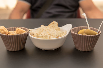 Midsection of man preparing food on table