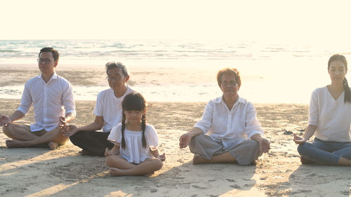 People sitting on beach