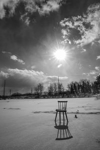 Scenic view of snow covered landscape against sky