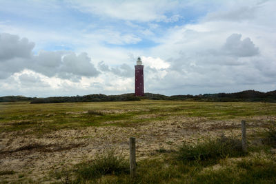 The 56 meter high angular west head lighthouse in ouddorp in the netherlands, on zeeland in europe 
