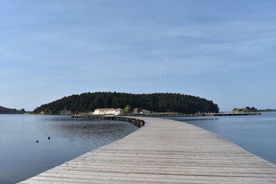 Pier over sea against sky in zvërnec