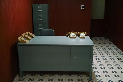 Rotary phones on table in office