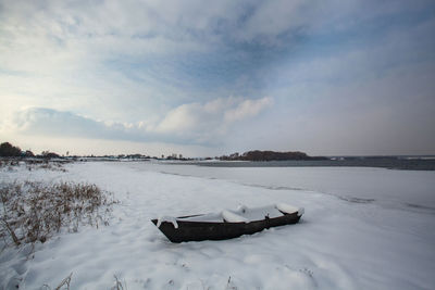 Scenic view of sea against sky during winter