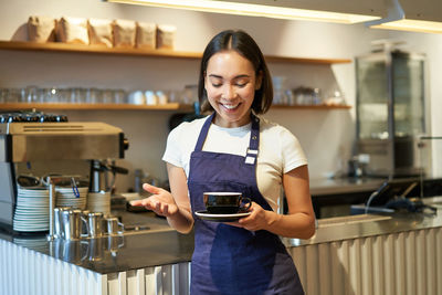 Young woman using mobile phone