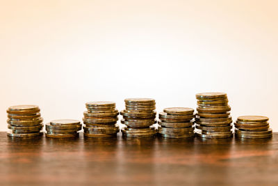 Stack of coins on table