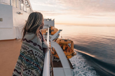 Rear view of woman looking at sea