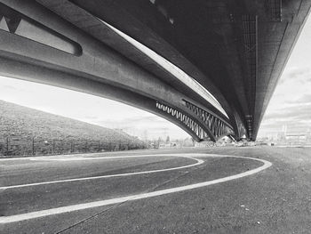 View of bridge over road in city