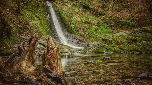 Close-up of waterfall against sky