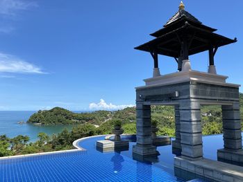 View of swimming pool against blue sky