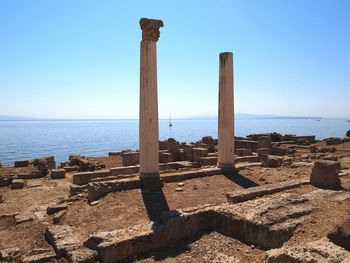 Scenic view of sea against clear blue sky