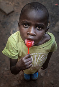 Close-up of young woman eating food