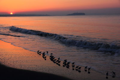 Scenic view of sea against sky during sunset