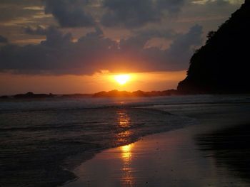 Scenic view of sea at sunset