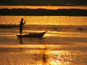 Scenic view of sea at sunset