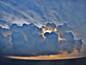 Low angle view of clouds in sky during sunset