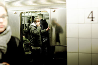 People on train at subway station