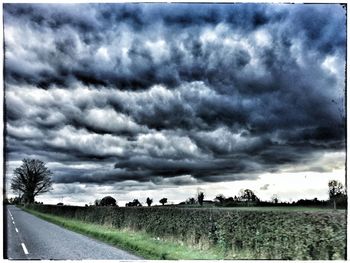 Storm clouds over grass