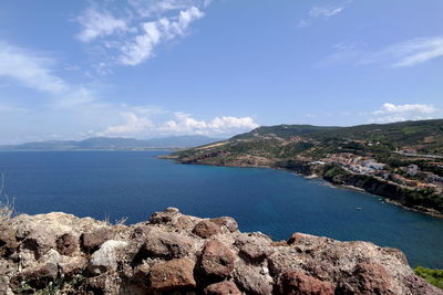 Scenic view of bay against sky