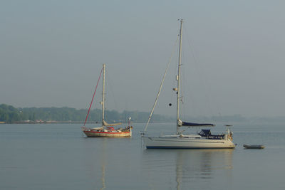 Boats sailing in sea