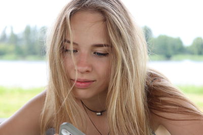 Close-up of beautiful woman with blond hair